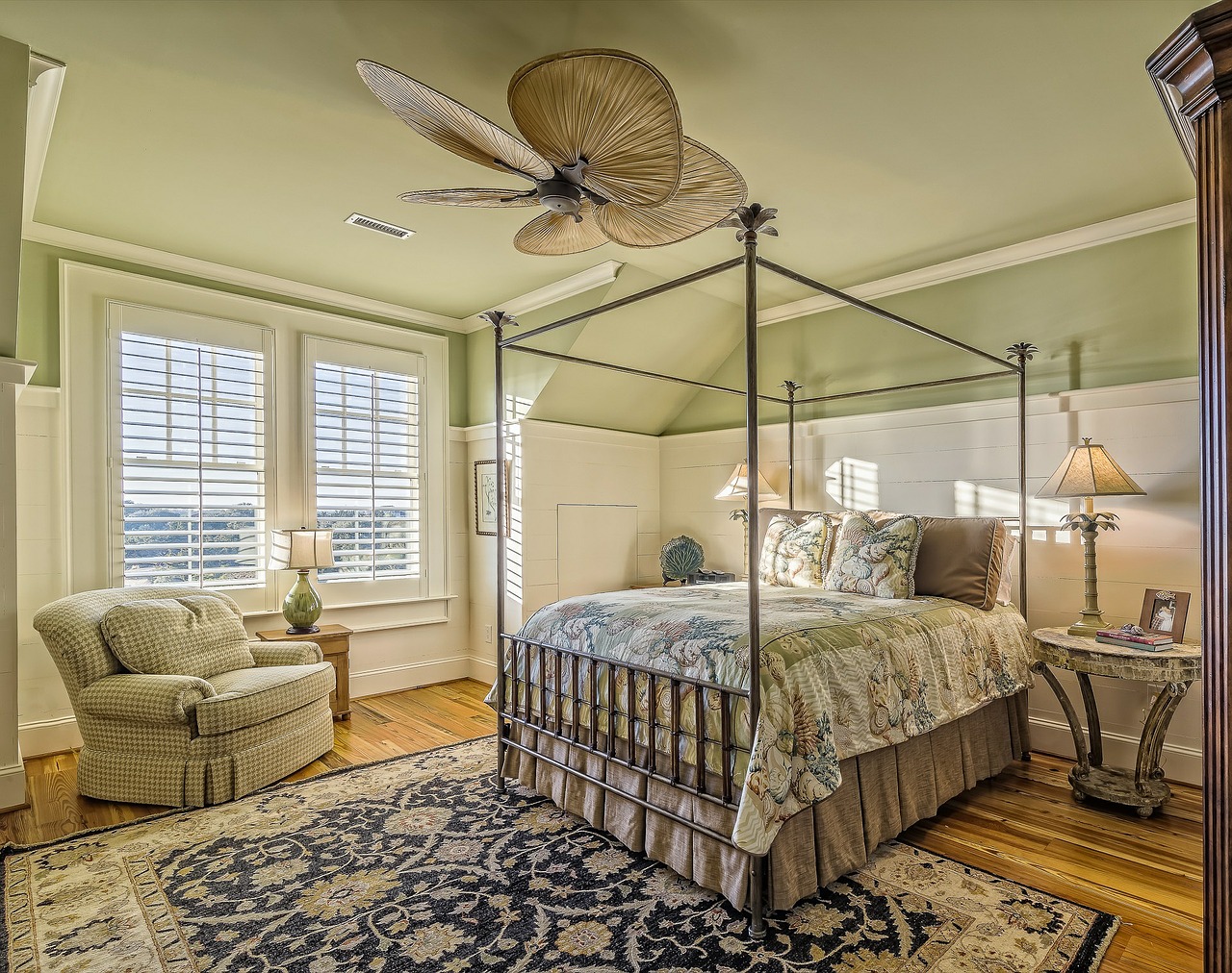 modern bedroom with large rug and hardwood floors